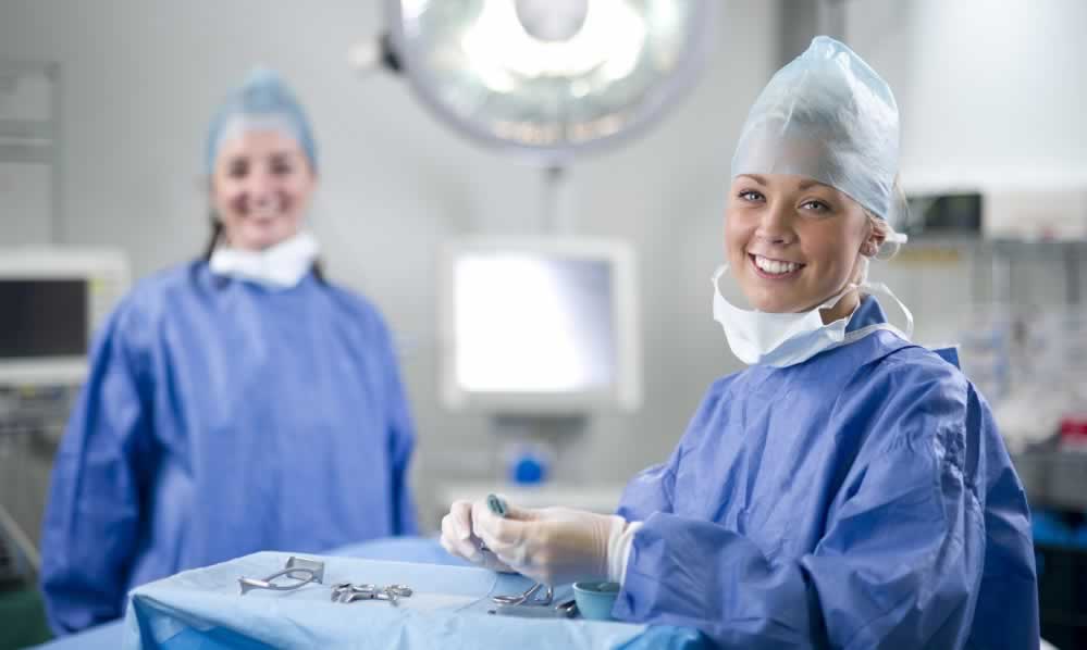 Surgeons in operating room with tools