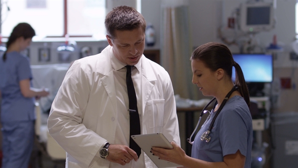 Doctors discussing patient care in hospital